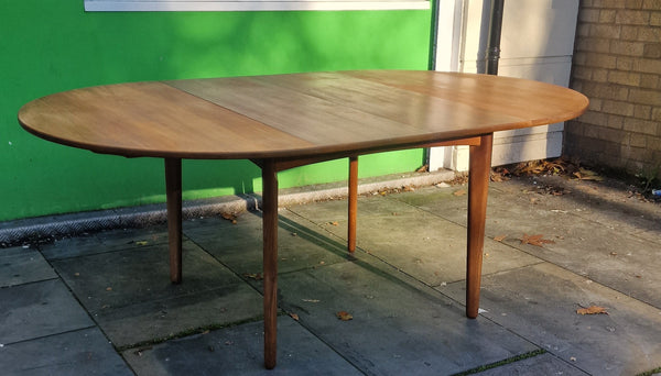1960s Danish extendable round dining.      SOLD