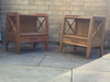 A pair of bedside cabinets by Jacques Adnet