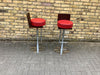 A pair of Poltrona Frau Bar Stools