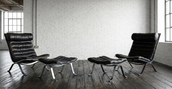 A pair of Ari lounge chairs with ottomans by Arne Norell for Norell Möbel AB,