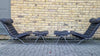 A pair of Ari lounge chairs with ottomans by Arne Norell for Norell Möbel AB,